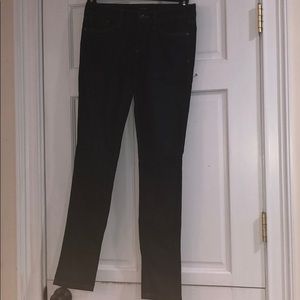 a pair of dark-wash Joes skinny jeans